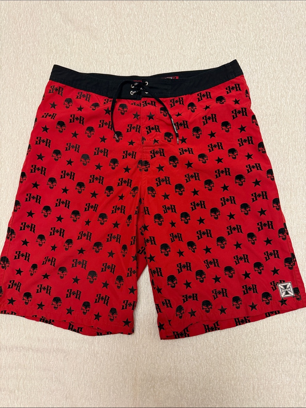 Third Rail Red Swim Board Shorts with Black Skull Print